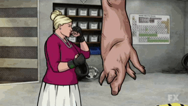 Gif of Pam Poovey punching a pig carcass 