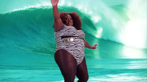 Girl surfing an ocean wave