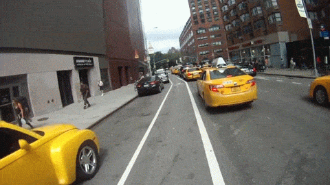 biking nyc doored GIF