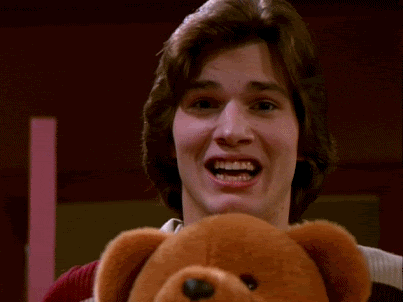 Hollywood actor, Ashton Kutcher, clutches teddy bear as he screams in fright
