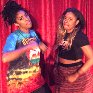 Two black women dancing