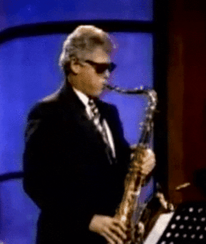 bill clinton saxophone gif