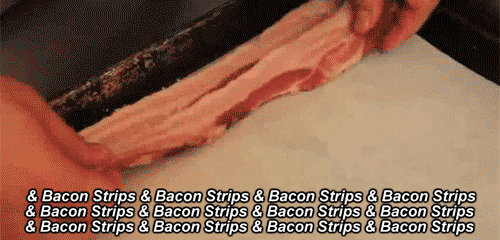 lots of bacon being lined on a tray