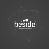 beside