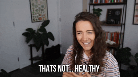 Woman laughing awkwardly, captioned 'That's not... healthy'