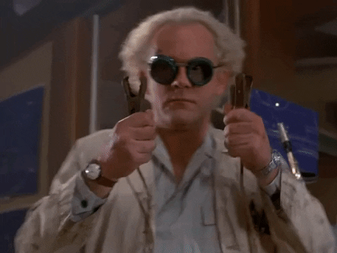 Back to the Future character Dr. Emmett Brown holds up two cables and says Ready