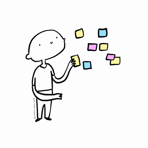 An animated character posting a sticky note on the wall