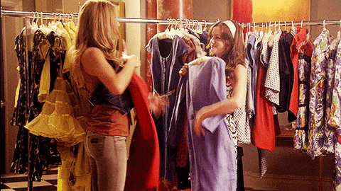 Gif of a scene from the TV show "Gossip Girl" showing two female characters shopping for clothes