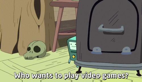 BMO, do desenho Hora de Aventura, dizendo em inglês "quem quer jogar video games?"