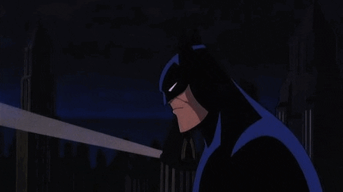 batman calls superman with bat signal gif