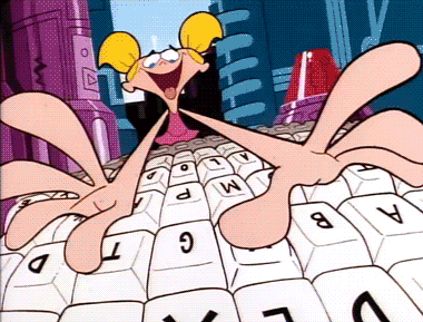 Dee-Dee, character from cartoon Dexter's Laboratory types maniacally at a computer