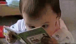 baby reading a book 
