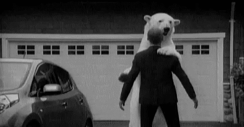 Gives a bear hug