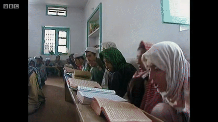 reciting the Koran at a madrassa