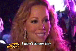 Mariah Carey shaking her head and saying I don't know her