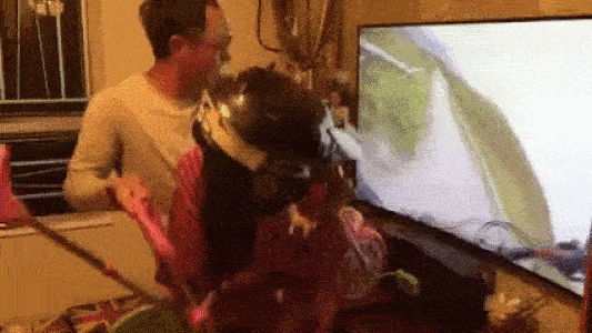 a girl playing game with daddy