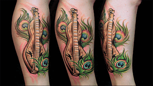 peacock feathers tattoo gifs find amp share on giphy peacock feathers tattoo gifs find amp share on giphy