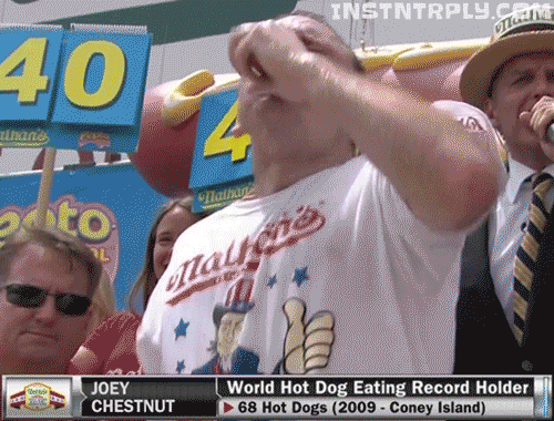 animated gif picture of Joey Chestnut, the World Hot Dog Eating Record Holder, swallowing hotdogs