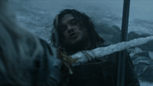 Jon Snow in a sword fight with an enemy. 