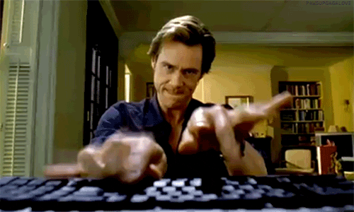 Jim Carrey is typing on a keyboard.