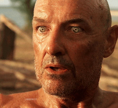 John Locke from TV show "Lost" looking up, stunned