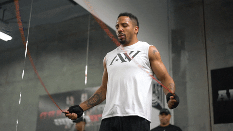 Former professional boxer Andre Ward using a skipping rope at a gym