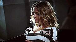 Barbara sitting and flipping through a book while sitting in a jail cell. Barbara sitting and flipping through a book while sitting in a jail cell.