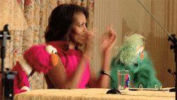  happy dancing excited sesame street michelle obama GIF