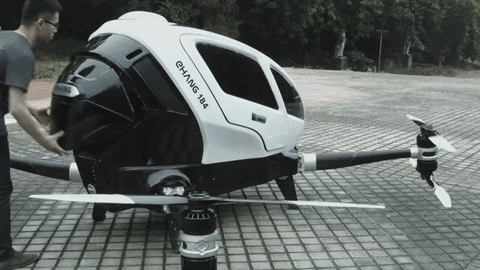 ইহাং ১৮৪ঃ(ভিডিওতেঃ ইহাং ১৮৪  এর ডেমনেস্ট্রেশন।)তুমি যদি নিরাপত্তা বিষয়ে  বেশী সচেতন হও, তাহলে ইহাং ১৮৪ তোমার জন্য সর্বোত্তম। ইহাং ১৮৪ একটি  উড়ন্ত বাহন/পাসেঞ্জার ড্রোণ (স্বল্প থেকে মধ্যম দূরত্বের পরিবহণ ব্যবস্থা)।  এটি  ছি ই এস ২০১৫ তে  প্রথম প্রদর্শিত হয়।" নিরাপত্তা " হল এর প্রধান  বৈশিষ্ট্য। এটি বিদ্যুৎচালিত। যদি এর এক সেট পাওয়ার সিস্টেমে বিভ্রাট ঘটে,  তবুও এটি  তার উড্ডয়ন  প্রক্রিয়া ও যাত্রীকে নিরাপদ রাখতে পারে।এর ফেইল-সেফ সিস্টেম রয়েছে। এর যেকোনো কম্পোনেন্ট এর যান্ত্রিক ত্রুটি/বিচ্ছিন্ন হলেও  এটি  নিকটবর্তী  এলাকায় দ্রুত নিরাপদ অবতরণ করতে পারে। এর কমুউনিকেসন্স সিস্টেম  এনক্রিপটেড এবং প্রতিটি বাহনের স্বতন্ত্র "কি" রয়েছে। এর স্বয়ংক্রিয় উড্ডয়ন  বাবস্থা রয়েছে, যাতে ১ ক্লিকে নিখুঁতভাবে টেক-অফ ও নির্ধারিত পথে অবতরন করতে পারে। এই প্রক্রিয়ার জন্য এর স্বতন্ত্র ও সহজ একটি  অ্যাপ রয়েছে।বাহনটি সবসময় কমান্ড সেন্টারের সাথে যুক্ত থাকে। অত্যান্ত বাজে আবহাওয়ার সময়  কমান্ড সেন্টার একে টেক-অফে বাধা প্রদান করে। এর বহন ক্ষমতা ১০০ কেজি। গড় গতিবেগঃ ১০০ কিঃমিঃ/প্রতি ঘণ্টা। এটি  ২০১৭  তে বাজারে আসবে।তোমার  কাছে যথেষ্ট ডলার থাকলে, এখনই অর্ডার দিতে পার।