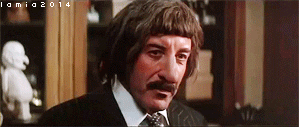 Peter Sellers as Insp. Clouseau ripping off a disguise