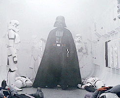 Darth Vader walking past his troops.
