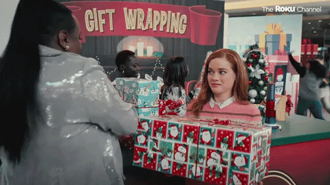 Zoey from Zoey's Extraordinary Christmas gets handed a pile of gifts and doesn't look real happy about it. This is why we're doing a No Gifts Christmas - no gifts = no stress! 