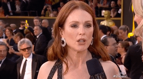 The Oscars julianne moore shrug red carpet nah