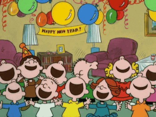 charlie brown peanuts cheering with balloons falling down onto them.