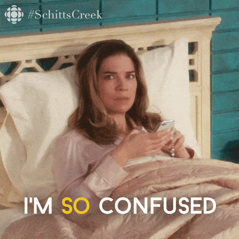 Schitt's Creek: Moira Rose, in bed with a phone in her hands, stares and says "I'm so confused"