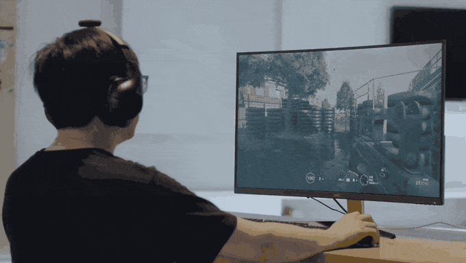 Tilted game controller in use
