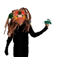 Figure in a fringed cardboard mask holding out a small green plant