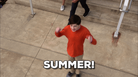 Gif of boy in red shirt pumping arms in the air yelling summer