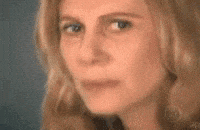 Confused woman surrounded by floating maths symbols and question marks, overwhelmed