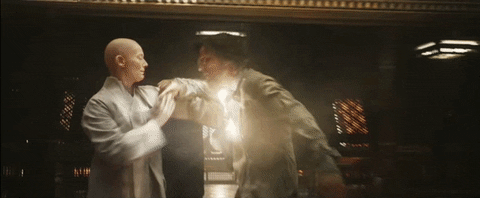 GIF of Doctor Strange's (Benedict Cumberbatch) astral form being pushed out of his physical body by the Ancient One (Tilda Swinton)