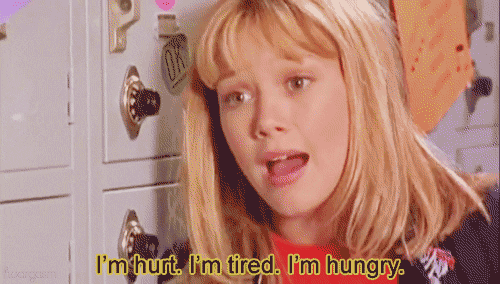 Hilary Duff as Lizzie Mcguire with a text I\'m Hurt. I\'m Tired. I\'m Hungry GIF