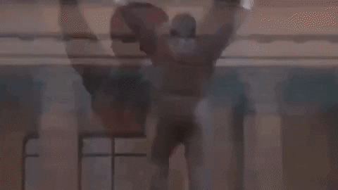 A gif of a guy standing with his 
