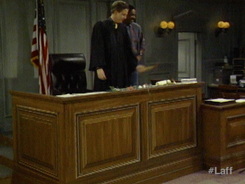 A judge's desk collapses beneath is slamming of the gavel