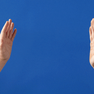 GIF of two people high fiving and blue confetti