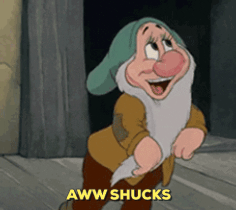 [Image description: A cartoon character blushes and says "Aww shucks" while turning away.] Via Giphy