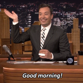 Jimmy Fallon zwaait en zegt goedemorgen met een glimlach