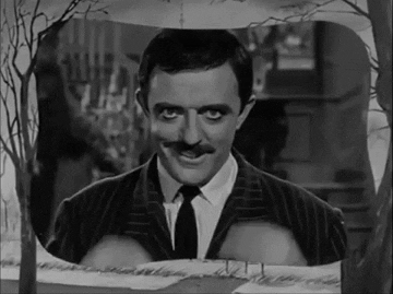 7 Famous TV Dads And The Money Lessons That They Taught Us - Gomez Addams