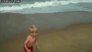 Kid diving into sand