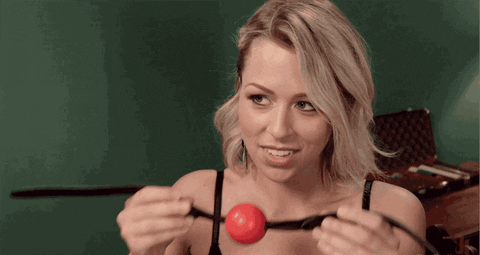 gorgeous woman with ball gag drool