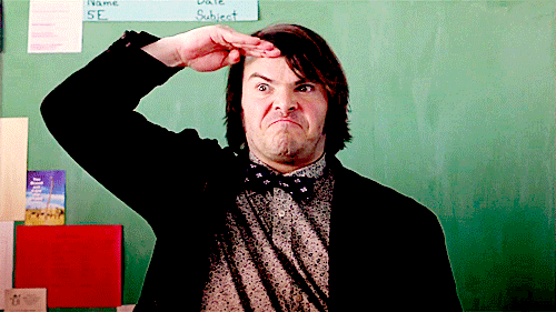 GIF from School of Rock: Jack Black gives an enthusiastic salute.